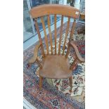 A Victorian ash and elm slat back grandfather chair