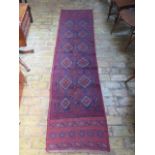 A hand knotted woollen- Meshwani Runner. 256 x 63 cm