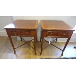 A pair of burr wood lamp tables each with a drawer on splayed legs united by a cross stretcher