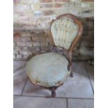 A Victorian walnut upholstered nursing chair. 74cm tall. Removed from a Cambridge property, owned by