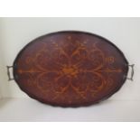A marquetry inlaid oval mahogany tray, 60cm x 40cm