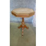 A Victorian marble top centre table on a tripod base 75cm tall x 52cm wide