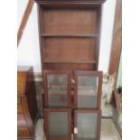 A mahogany 2 part bookcase with glazed doors in need of restoration. 198 cm tall x 87 cm x 34 cm.