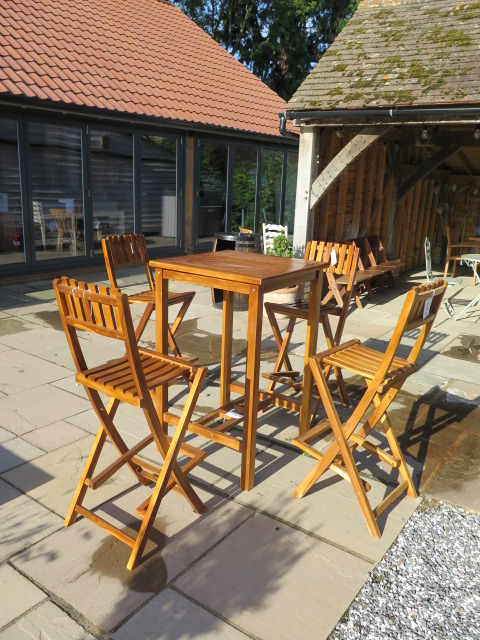 A new Oliver Heartwood Dunbar bar table and 4 Dunbar folding bar chairs, table 70cm x 70cm x 110cm