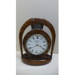 A very nice 8 day clock by brevette retailed by Thornhill and co, London. Case in shape of horse