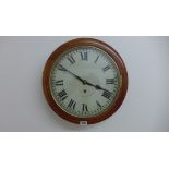 A 12 inch dial spring drive wallclock, brass bezel ,oak surround - running