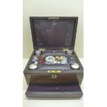 A rosewood work/sewing box & contents