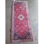 A hand knotted Hamadan woollen rug. Size 1.78 m x 0.70m