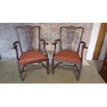 A pair of mahogany Chippendale style open armchairs with vase shaped splats on square moulded legs