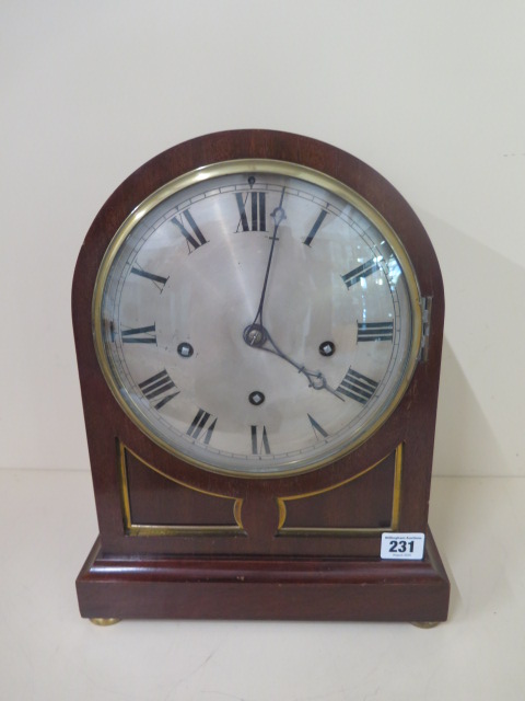 A mahogany 3 train striking and chiming mantle clock, 36cm tall running and chimes - no key - case