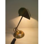 A good brass adjustable bankers desk lamp in working order, 41cm tall