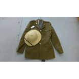 Army uniform, believed to be 254 Medical Regiment Field Ambulance Cambridge. Consists of tunic,
