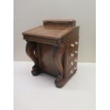 A miniature walnut Davenport desk. 19cm tall, 14 x 12cm. In very good condition.
