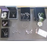 A collection of assorted silver and other Jewellery including a Jade flower necklace , Rose Quartz