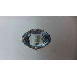 An art deco 14ct yellow and white metal Aquamarine and diamond ring, the emerald cut aquamarine