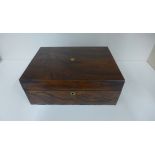 A rosewood workbox with content 12cm x 30 x 22cm in generally good condition