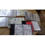 A collection of Denmark stamps in 7 albums.