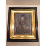 An early 19th century genuine antique Russian icon representing Christ exquisitely painted on what