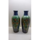A pair of English art deco ceramic vases decorated with orange trees, 42cm tall, generally good