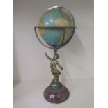 A Philips 10inch challenge globe in a brass mount on an ormulu cherub mount and marble base, 71cm