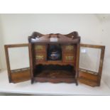 An oak presentation pipe smokers cabinet. 46cm tall, 41 x 20cm