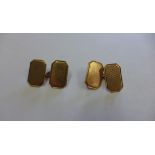 A pair of hallmarked 9ct gold cufflinks. Approx weight 4 grams. Generally good condition with some