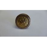 An Elizabeth II half gold sovereign ring, dated 1982, in a 9ct gold ring mount, size O, total weight