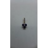 A hallmarked 9ct white gold lolite and diamond pendant. Lolite 0.66ct, pendant length 2cm approx 1.