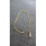 A hallmarked 9ct yellow gold 3-stone pendant on chain. Chain 46cm long approx weight 3.4gs -
