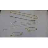 Four 9ct gold bracelets and a broken 9ct gold necklace. Total weight approx 10.8 grams