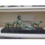 An art deco spelter group on a marble base. 27 x 65cm. Generally good condition, some wear.