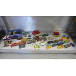 A collection of assorted diecast toys, including Dinky, a boxed Dinky Toys Cooper Racing car no:240,