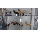 8 x Beswick horses: dappled grey, highland pony, exmoor pony, new forest pony, arab, piebald and two