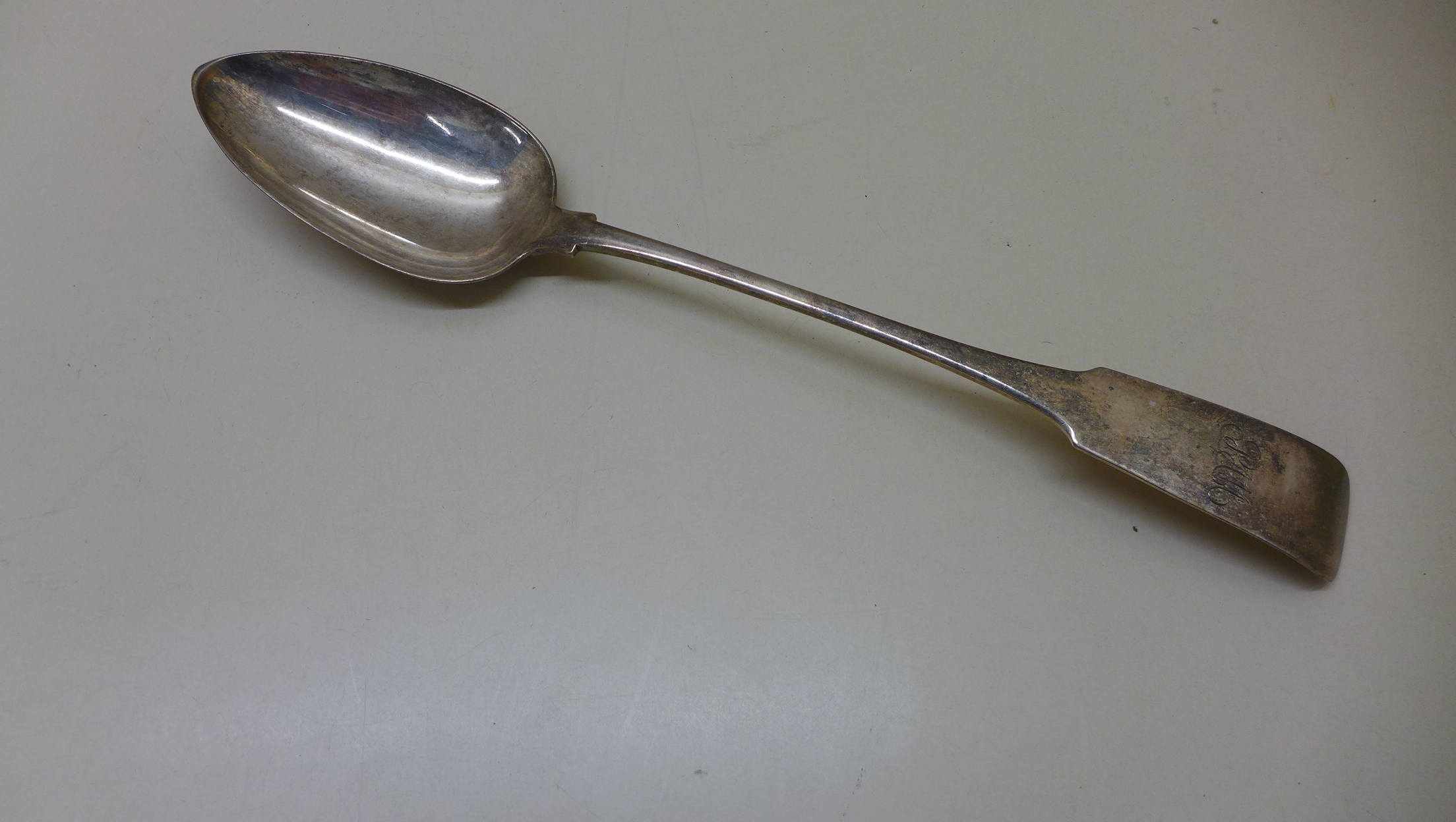 A Georgian Irish silver serving spoon. Dublin 1809 Maker JP, 33 cm long, approx 4.9 troy oz,