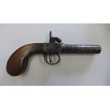 A percussion cap pocket pistol 18 cm long, cocks and fired, general wear consistent with age.