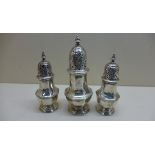 A pair of Georgian silver sifters. London 1746/47 13.5 cm tall total weight approx 9.1 troy oz