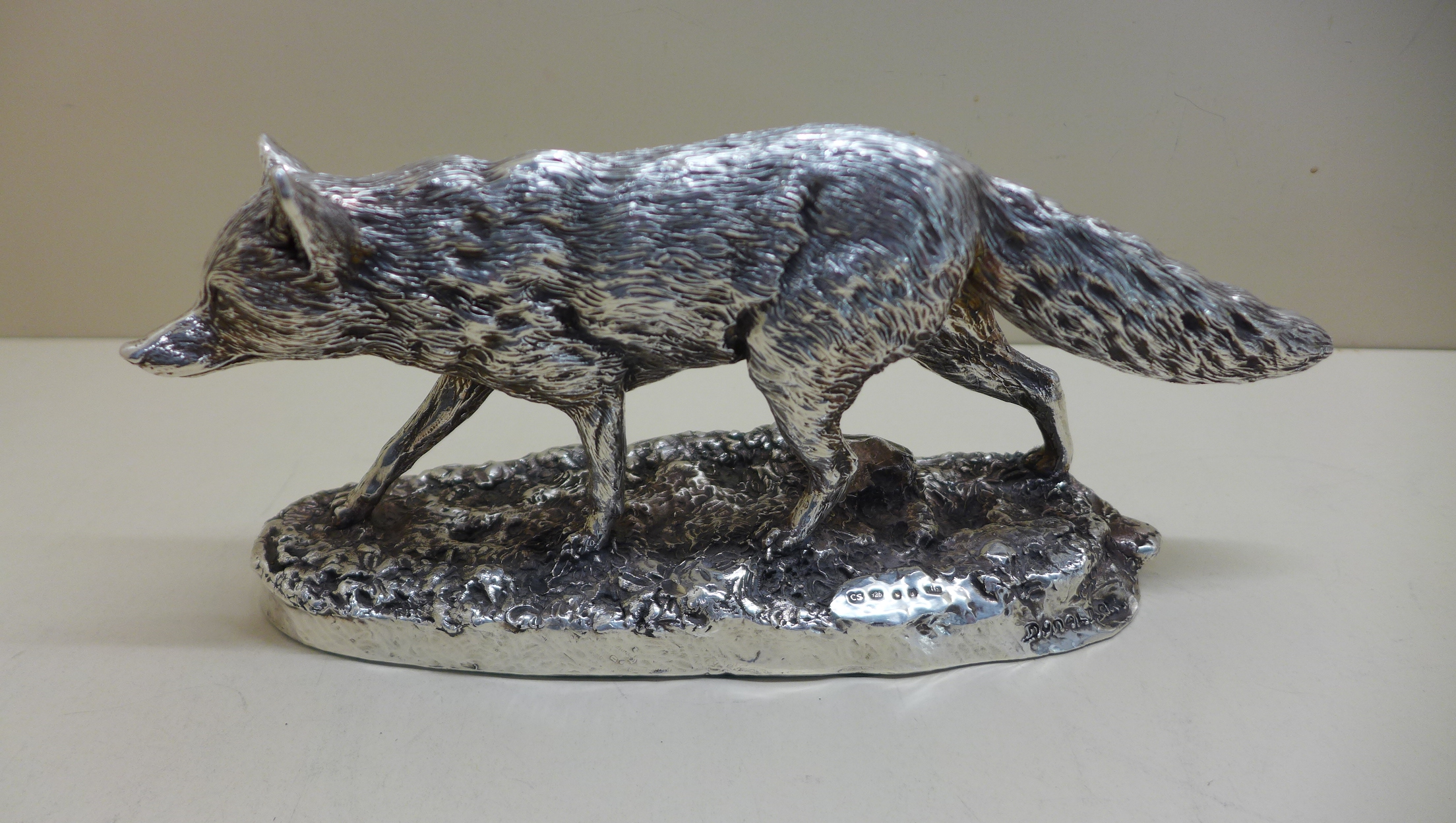 A modern silver resin filled model of a fox by Stiles Silver Sheffield - signed Donaldson. 24cm long - Image 2 of 4
