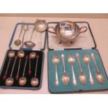 A silver plated twin handle bowl, assorted silver flatware including two 800 silver spoons, total