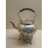A good quality solid silver spirit kettle, London 1891/92 approx 28.7 troy oz. Generally good,