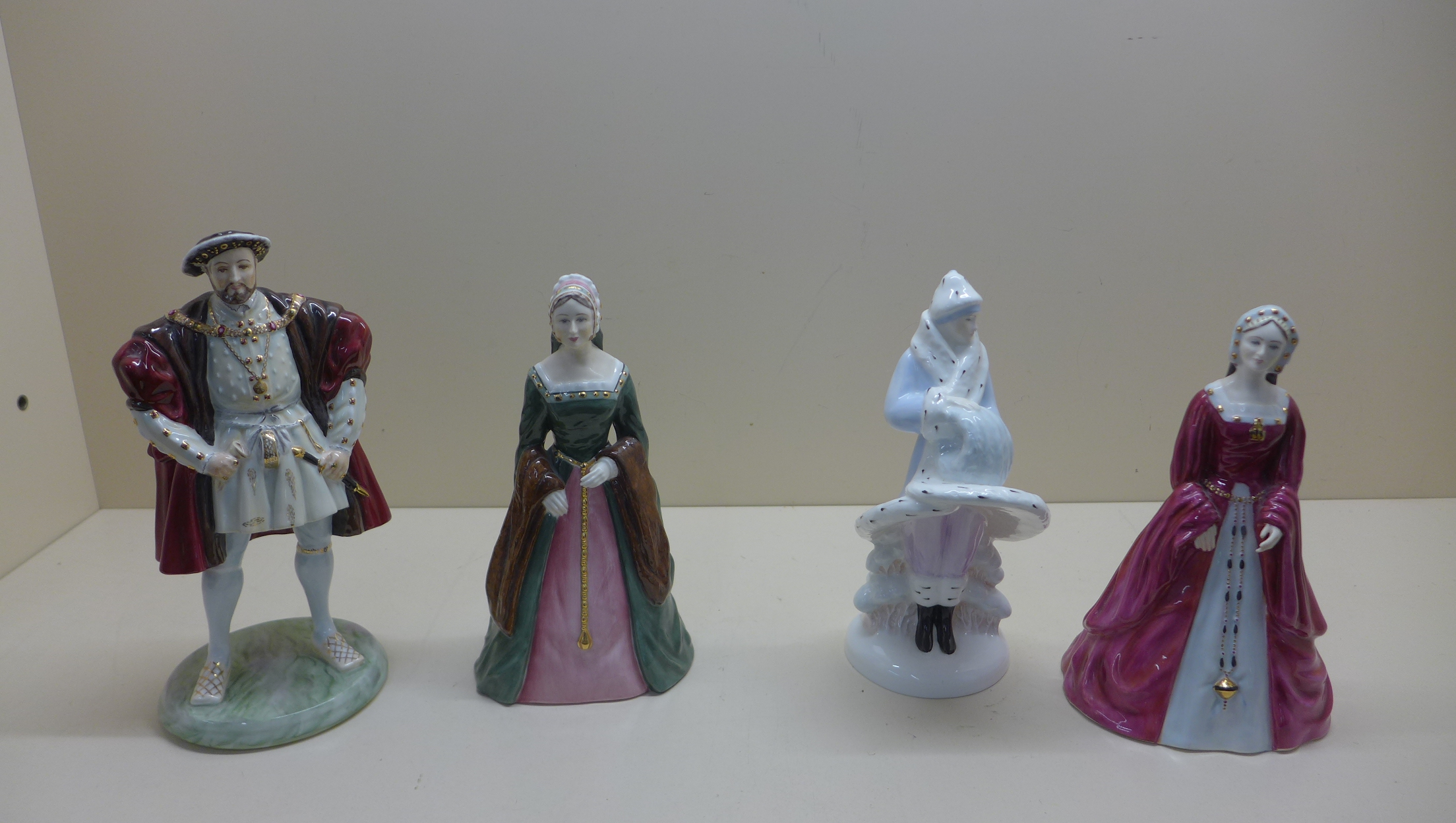 4 x coalport figures, Henry VIII, Jane Seymour, Catherine Parr and Miss 1920, all good