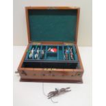 A Jaques mahogany cased 'Ascot the New Racing game' with 6 lead horses and counters in reasonably