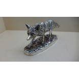 A modern silver resin filled model of a fox by Stiles Silver Sheffield - signed Donaldson. 24cm long