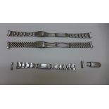 Three vintage Rolex steel watch bracelets with folded links. Oysters have 17 and 19mm ends and