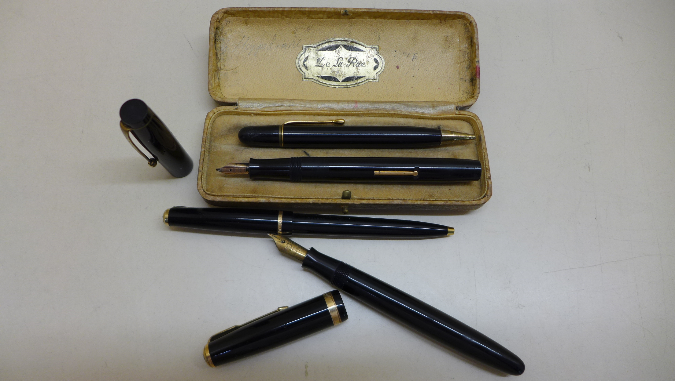 A cased De La Rue gold nib fountain pen and pencil together with a large size Parker Duofold and - Image 2 of 2