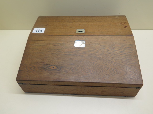 A small 19th century Rosewood writing slope, 27cm wide, 9cm tall, 23cm deep.