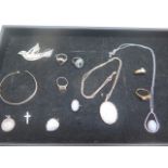 A selection of assorted silver and dress jewellery.