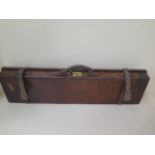 A Holland and Holland leather shotgun case 83 x 23 x 9cm with good rich colour