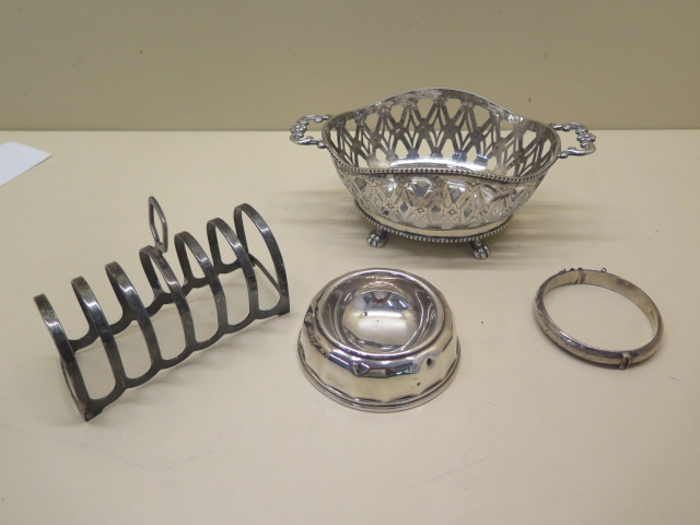 A Dutch 835 silver twin handle bowl, approx 4.9 troy oz, a silver toast rack, bangle and bowl,