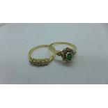 An 18ct gold five stone diamond ring, size N, approx 1.6 grams and a 9ct gold dress ring, size Q,
