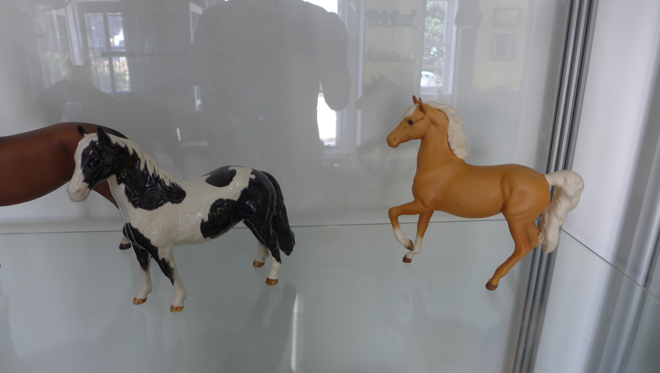 8 x Beswick horses: dappled grey, highland pony, exmoor pony, new forest pony, arab, piebald and two - Image 5 of 5